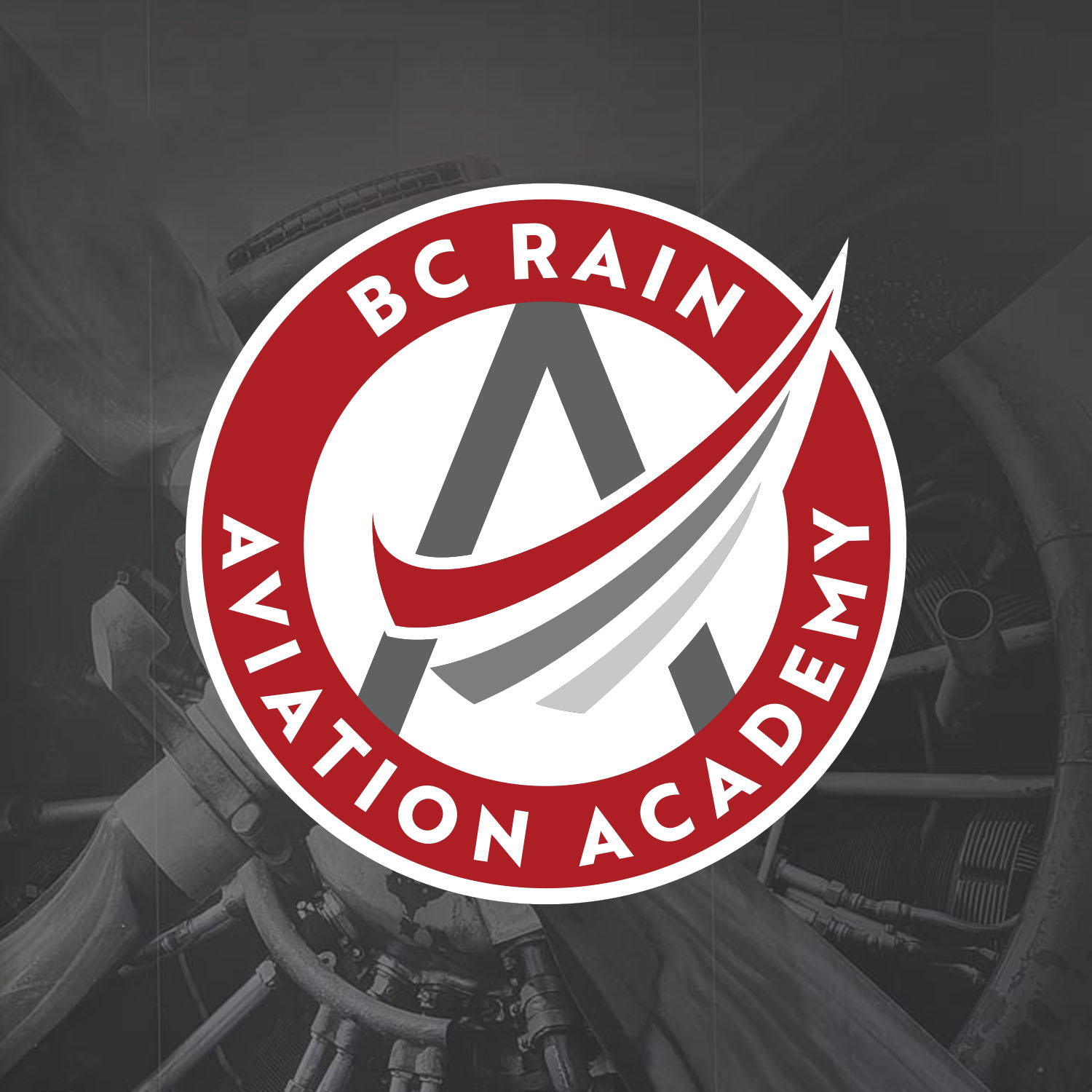 BC Rain Aviation Academy logo on background of aircraft propeller engine