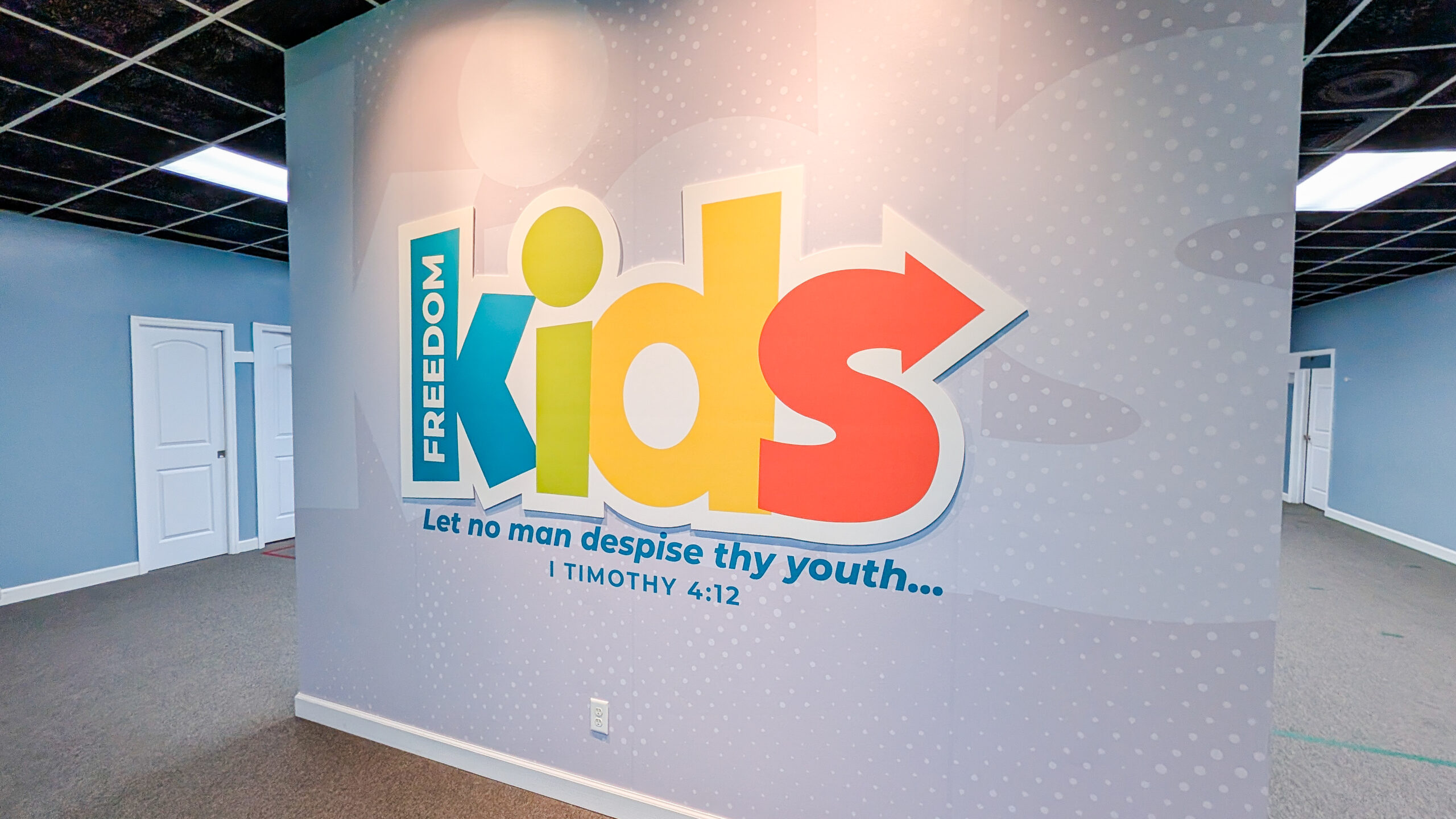 Kids ministry wall wrap designed for Freedom Baptist Church children’s department