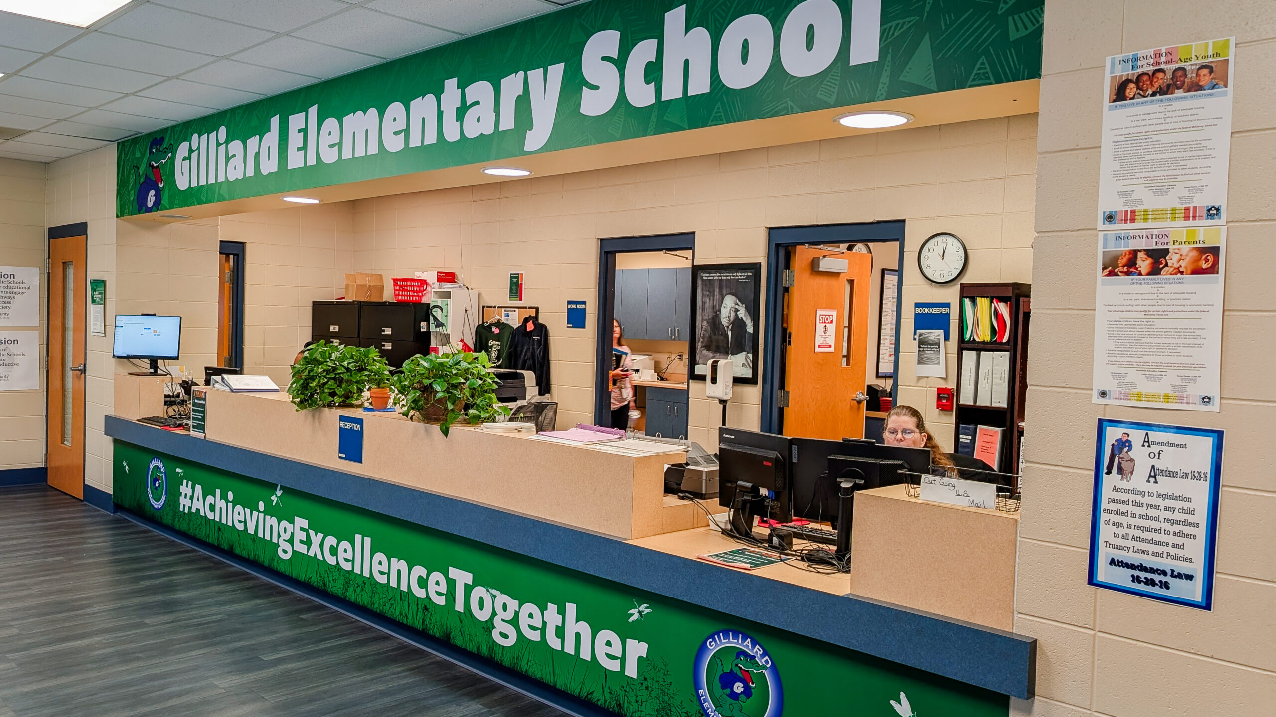 Custom front office wall wrap installed at Gillard Elementary School in Mobile, Alabama, featuring school branding