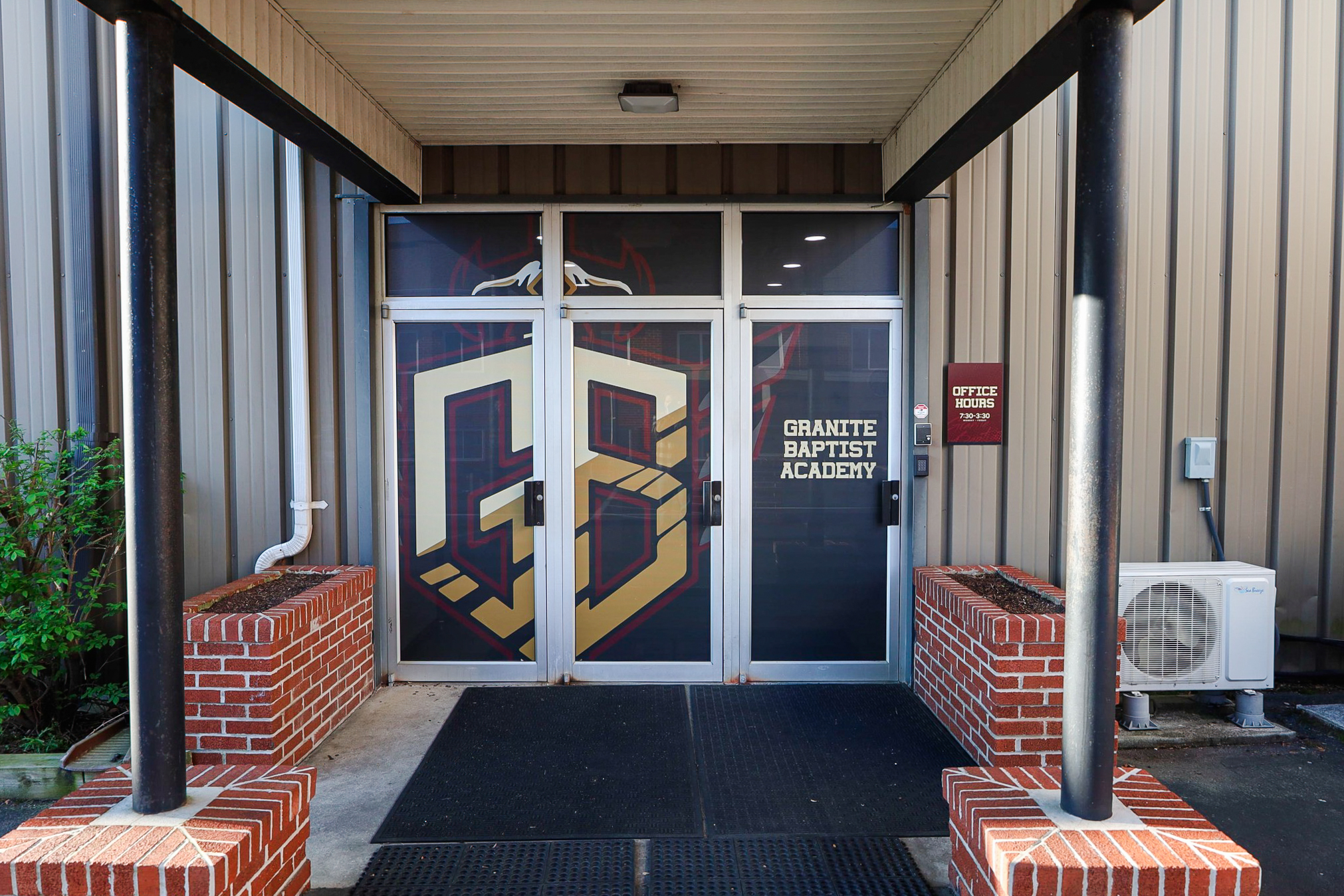 School entrance window perf graphics with logo branding