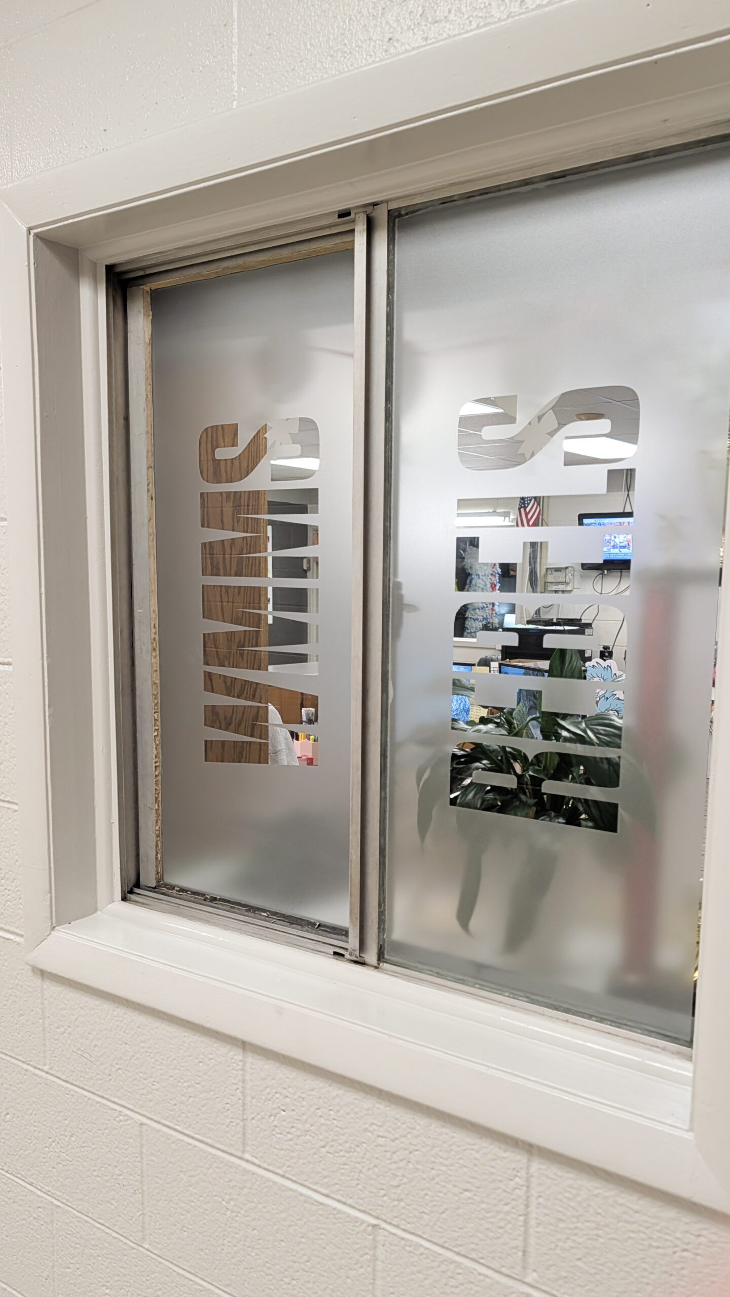 West Morgan Middle School Office Etched Glass Vinyl Custom frosted etched glass vinyl applied to interior office windows at West Morgan Middle School.