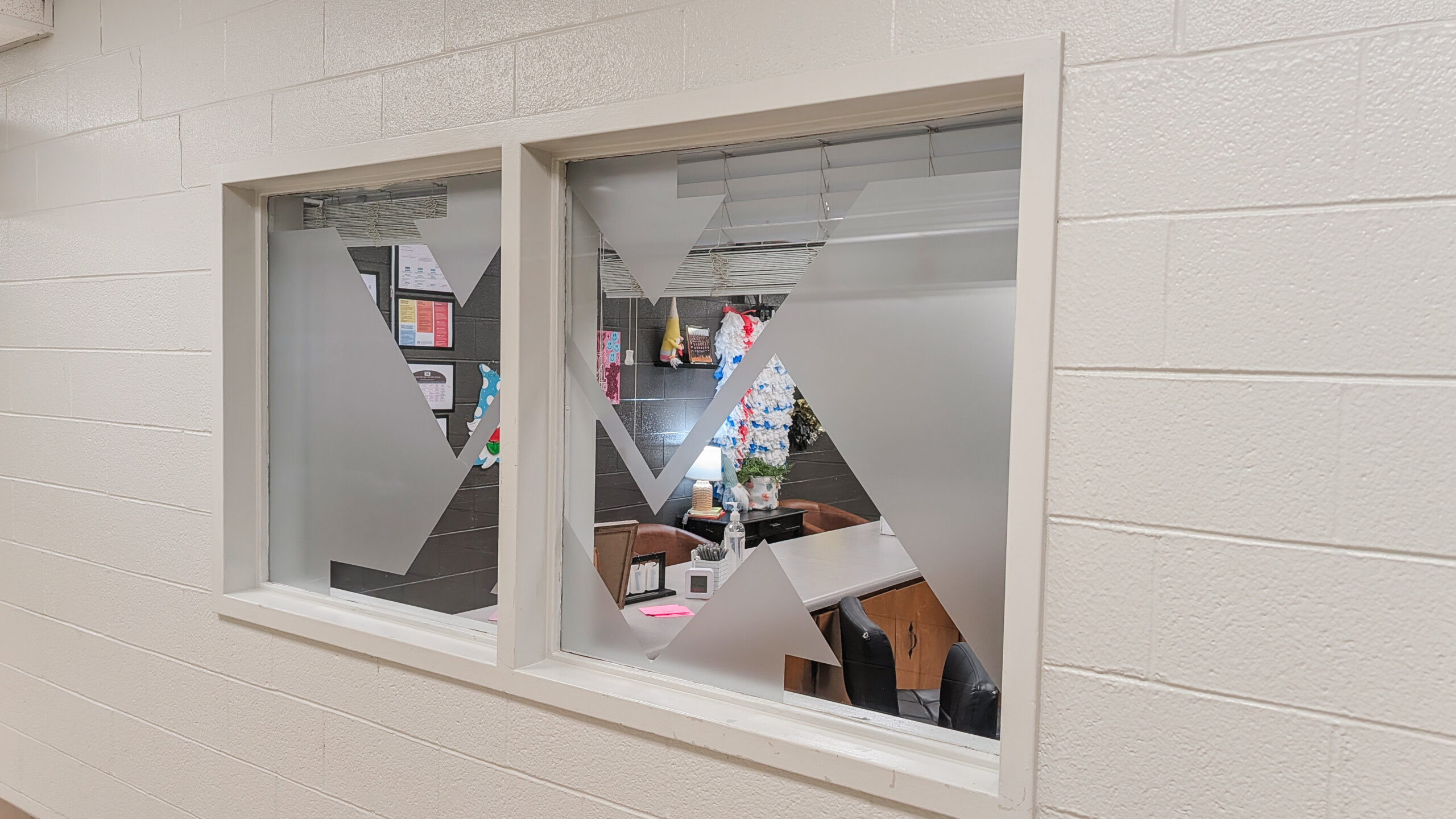West Morgan Middle School Interior Window Privacy Graphics Custom frosted etched glass vinyl applied to interior office windows at West Morgan Middle School.
